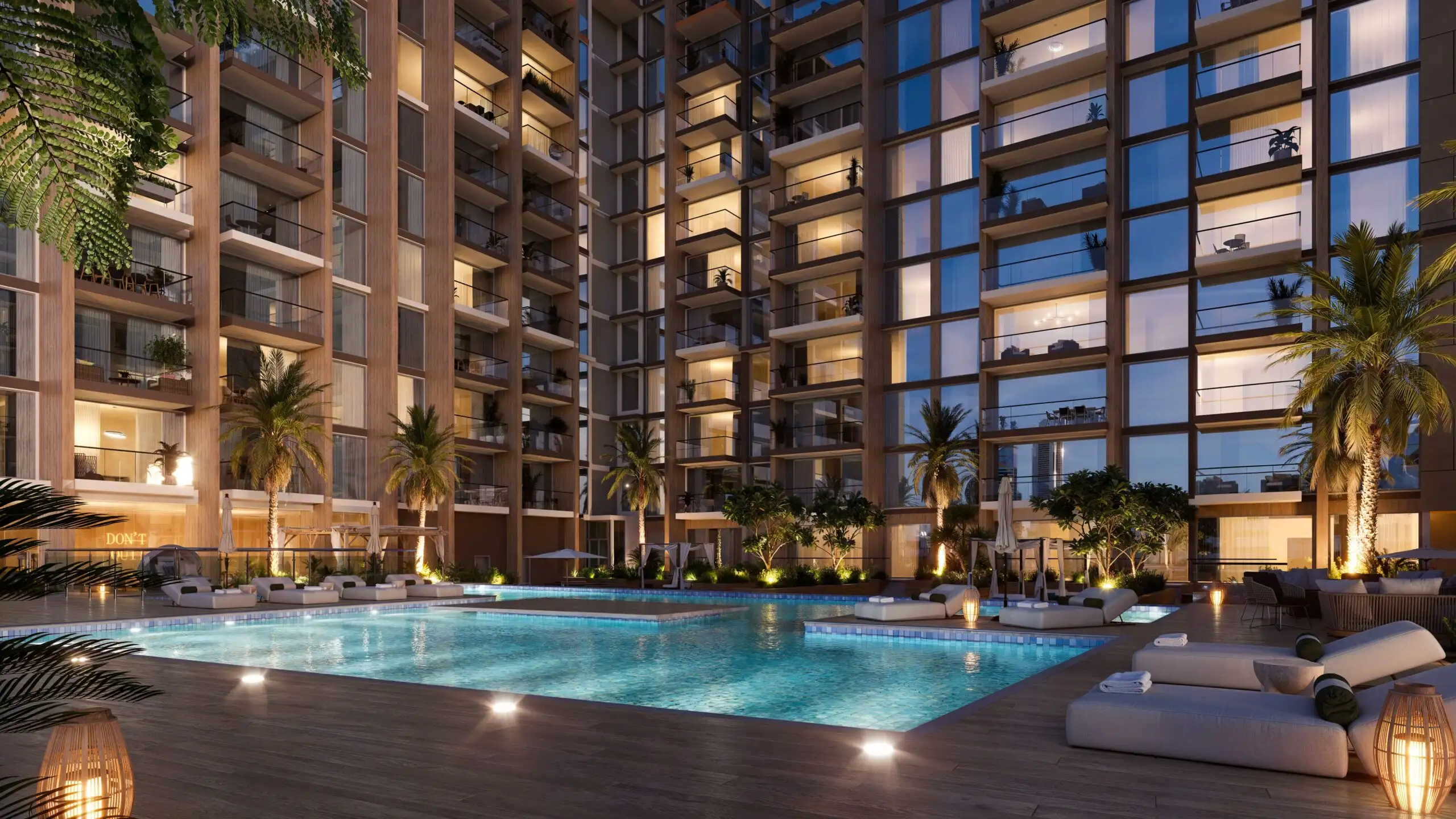 Night view of Taiyo Residences pool designed by LMD in Al Wasl Gate